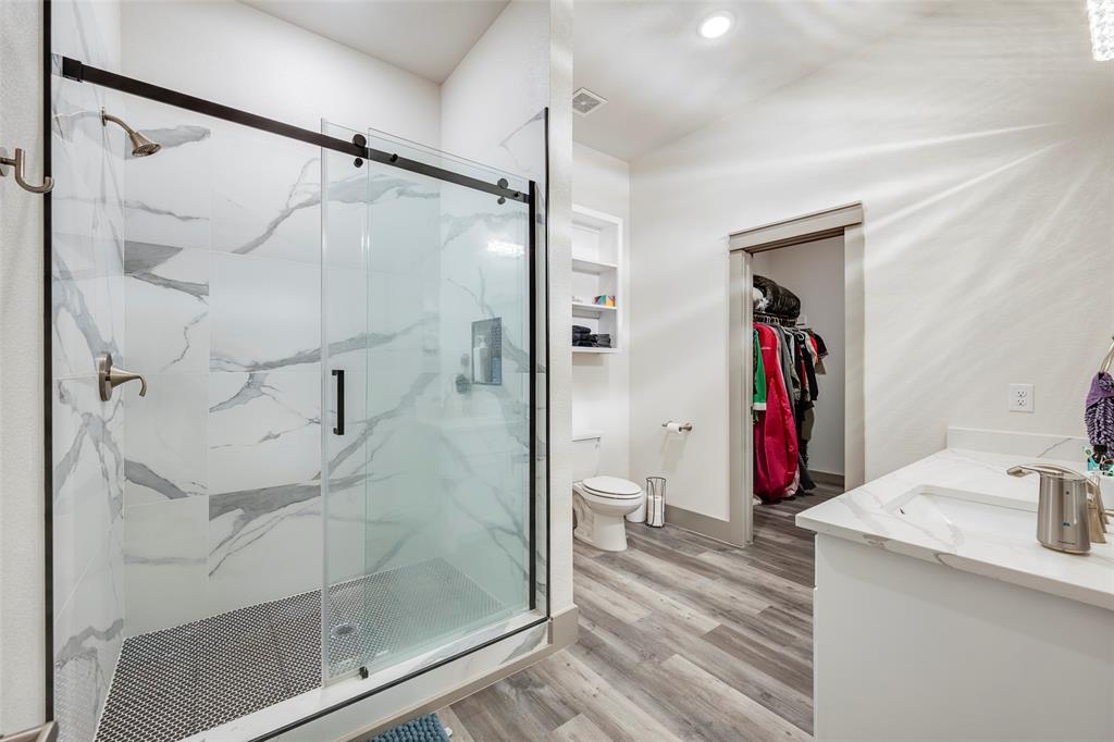 705 Old Agnes Road Weatherford, TX 76088 - Photo 21 of 32 a bathroom with a sink and a shower