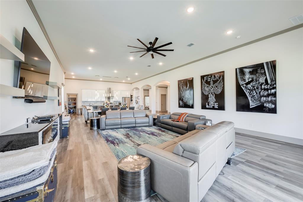 705 Old Agnes Road Weatherford, TX 76088 - Photo 26 of 32 a living room with furniture and kitchen view