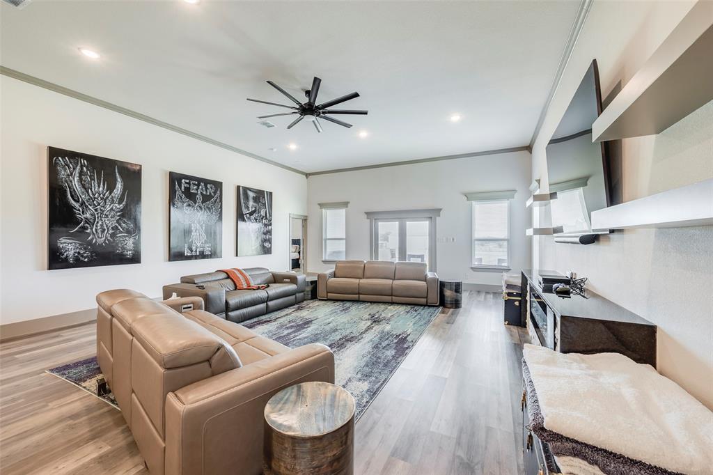 705 Old Agnes Road Weatherford, TX 76088 - Photo 10 of 32 a living room with furniture and wooden floor