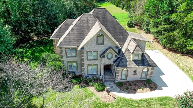 $990,000 | 7303 Horseshoe Bend Trail, Summerfield, NC 27358