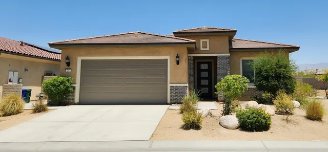 a front view of house with yard