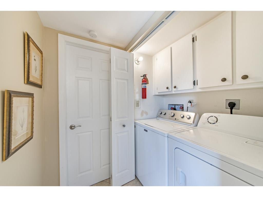 740 Teryl Road, Unit 2074 Naples, FL 34112 - Photo 16 of 18 a view of kitchen with cabinets