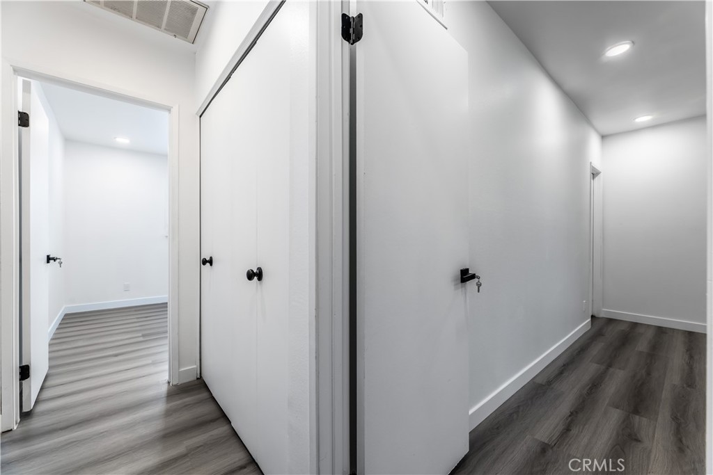 7953 Vía Latina Burbank, CA 91504 - Photo 17 of 30 a view of hallway with wooden floor