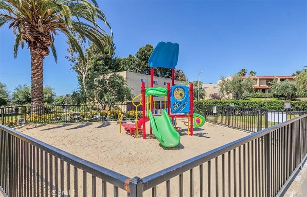 7953 Vía Latina Burbank, CA 91504 - Photo 26 of 30 a view of sitting area with swimming pool and trees in the background