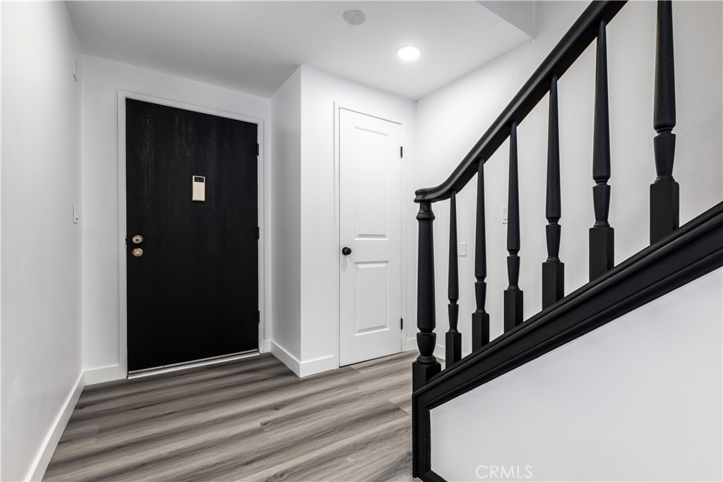 7953 Vía Latina Burbank, CA 91504 - Photo 8 of 30 a view of a staircase with wooden floor and staircase