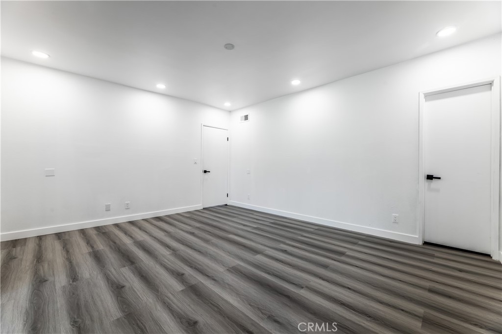 7953 Vía Latina Burbank, CA 91504 - Photo 10 of 30 a view of room with wooden floor