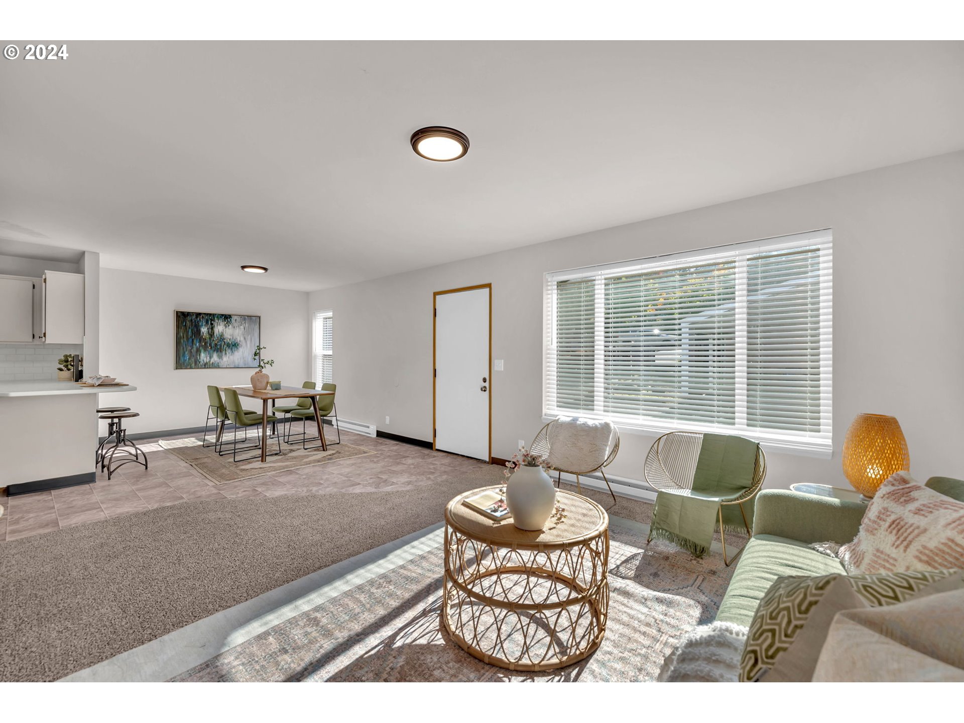902 Pioneer Street, Unit 910 Ridgefield, WA 98642 - Photo 16 of 31 a living room with furniture and a table