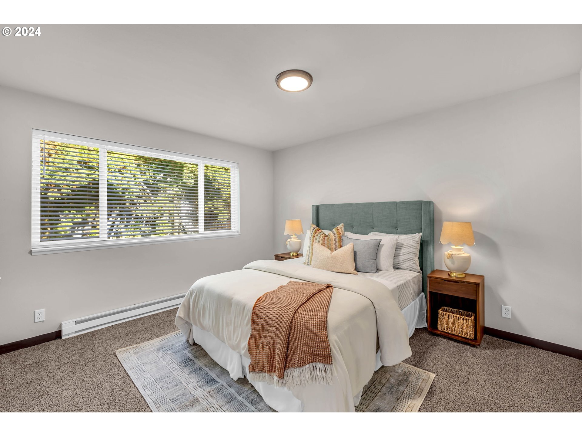 902 Pioneer Street, Unit 910 Ridgefield, WA 98642 - Photo 22 of 31 a bedroom with a bed and a window