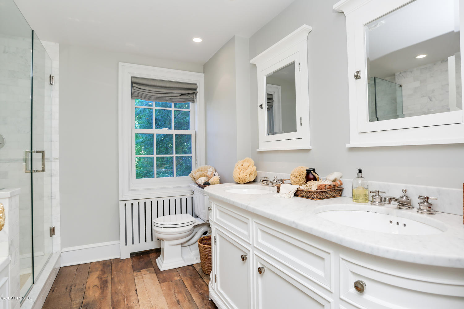 166 Old Church Road Greenwich, CT 06830 - Photo 12 of 20 a bathroom with a sink and a toilet