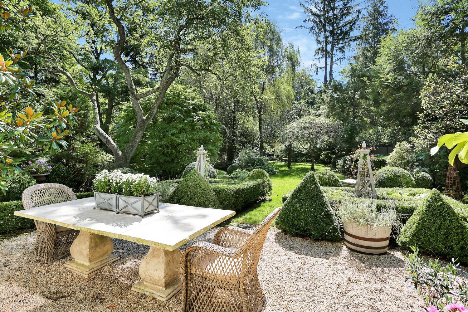166 Old Church Road Greenwich, CT 06830 - Photo 15 of 20 a view of a table and chairs in the patio