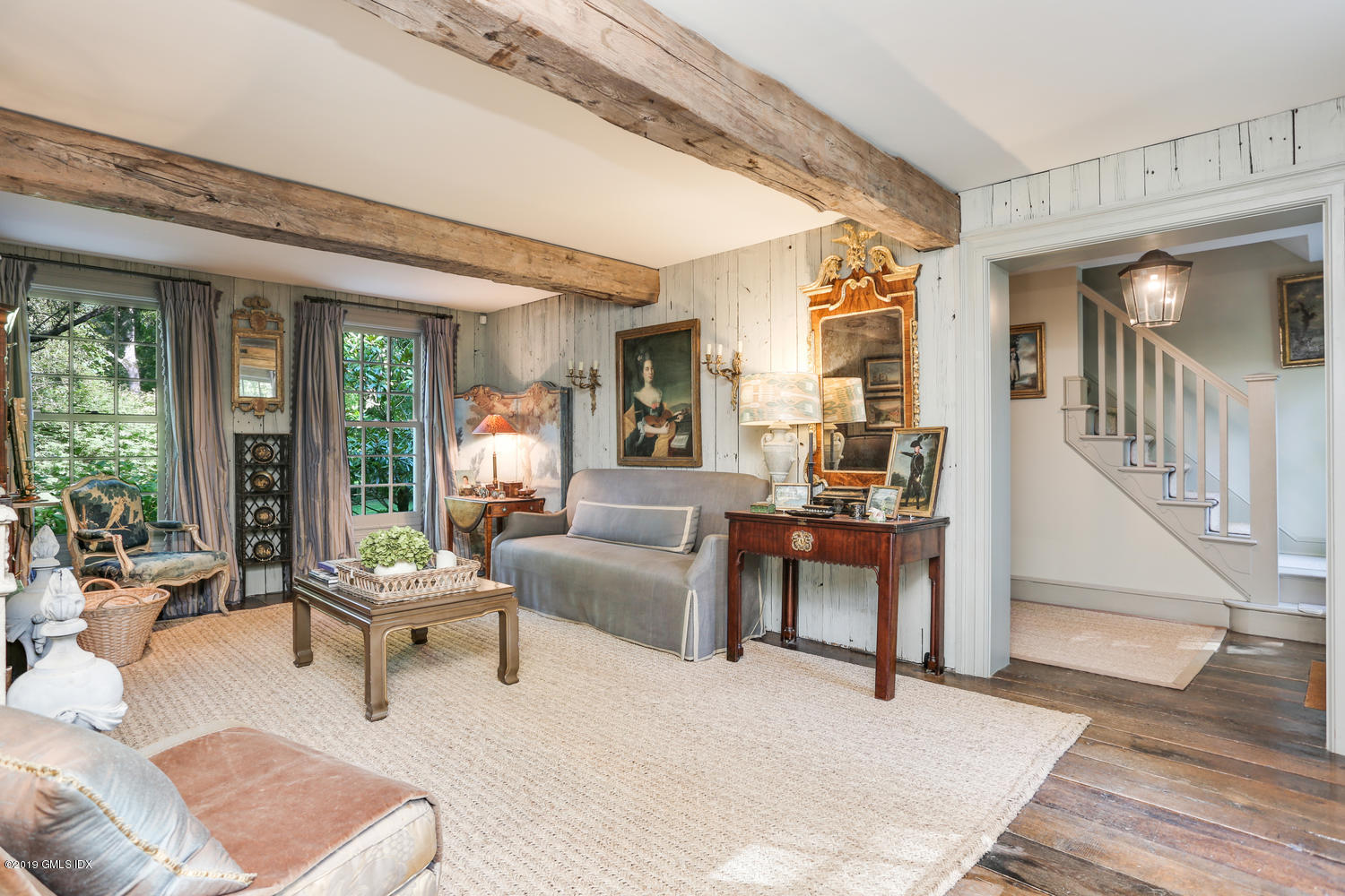 166 Old Church Road Greenwich, CT 06830 - Photo 4 of 20 a living room with furniture and a table
