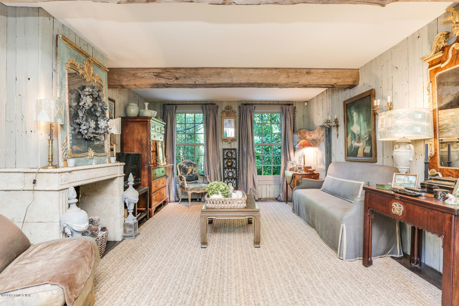 166 Old Church Road Greenwich, CT 06830 - Photo 5 of 20 a living room with furniture and a large window