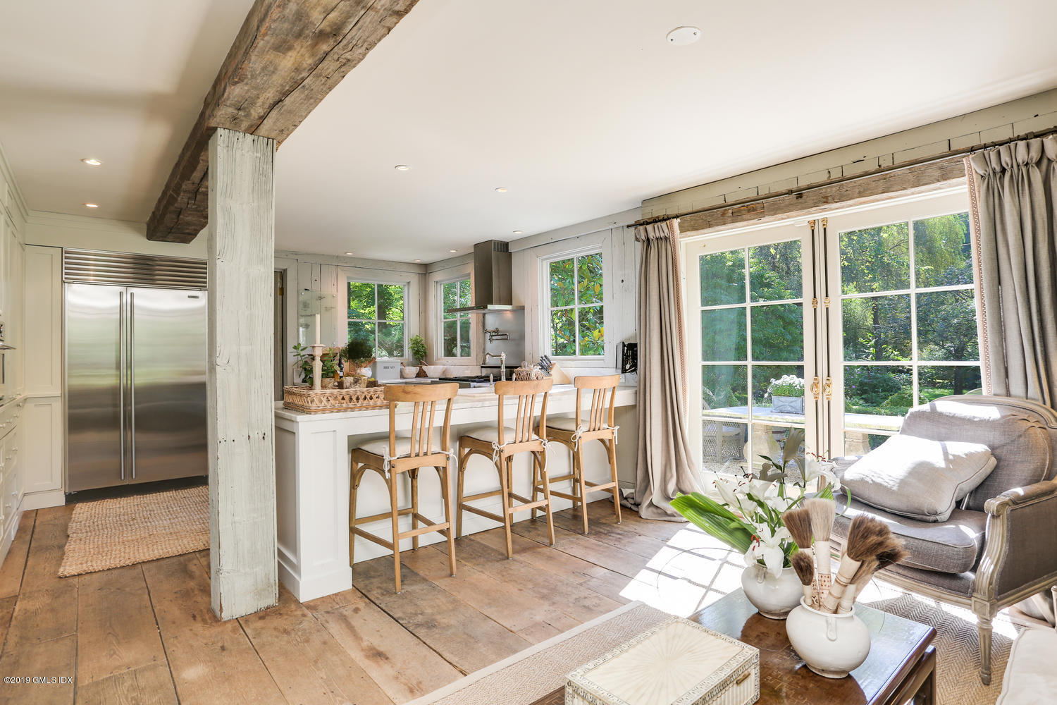 166 Old Church Road Greenwich, CT 06830 - Photo 6 of 20 a living room with furniture and a large window