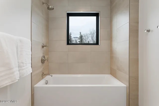 a bathroom with a bathtub