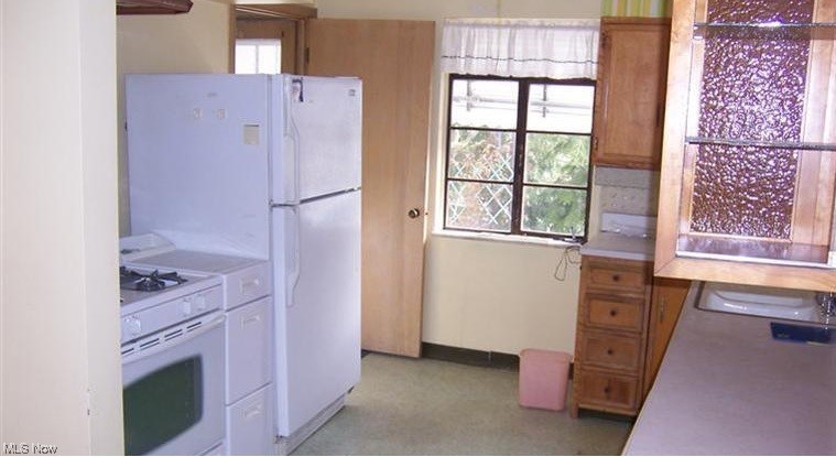 3185 Warren Road Cleveland, OH 44111 - Photo 16 of 19 Kitchen with white appliances