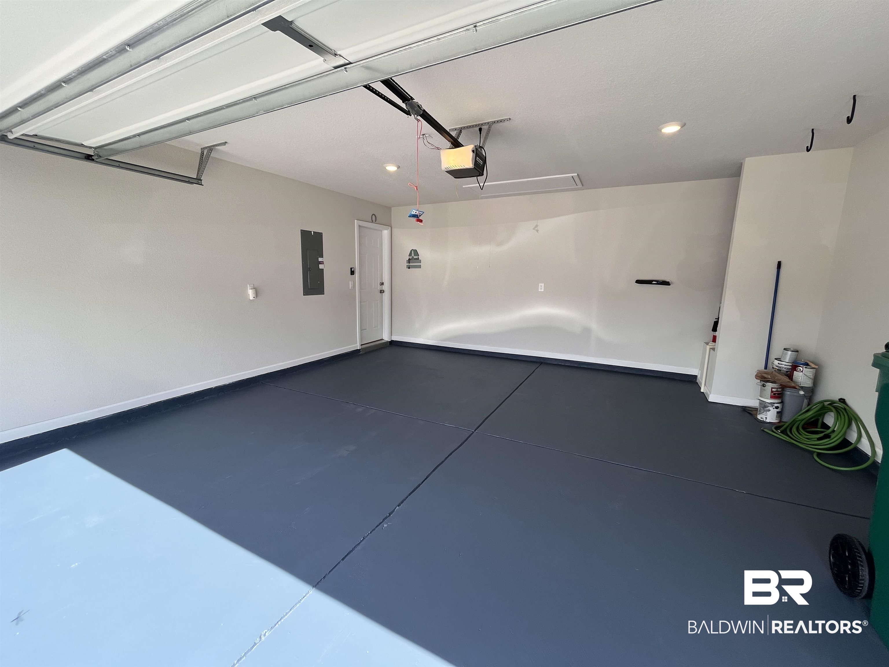 8891 Summer Bay Lane Foley, AL 36535 - Photo 48 of 54 Garage with electric panel and recessed lighting