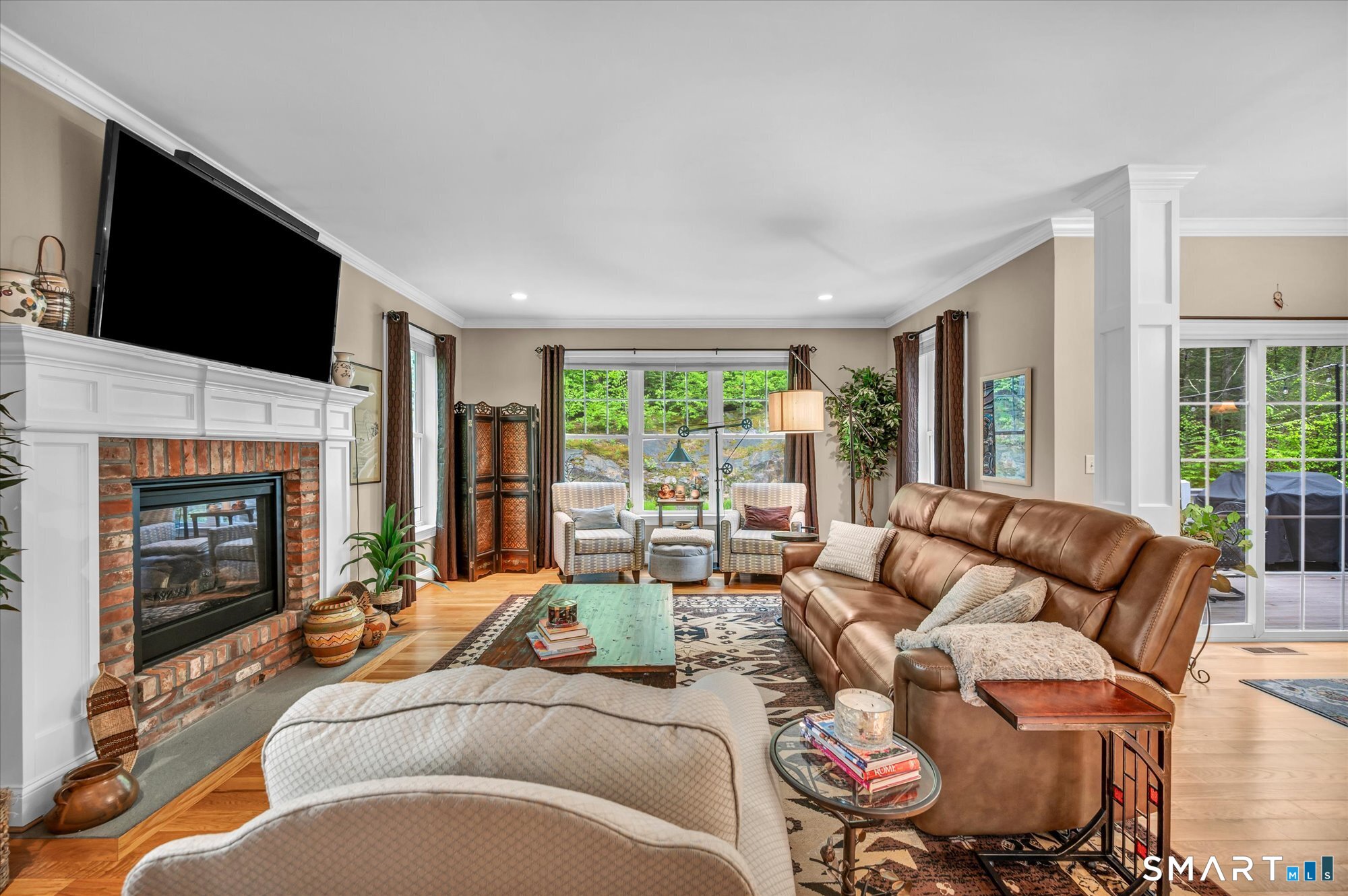 16 Sweetheart Mountain Road Canton, CT 06019 - Photo 10 of 40 a living room with furniture fireplace and flat screen tv