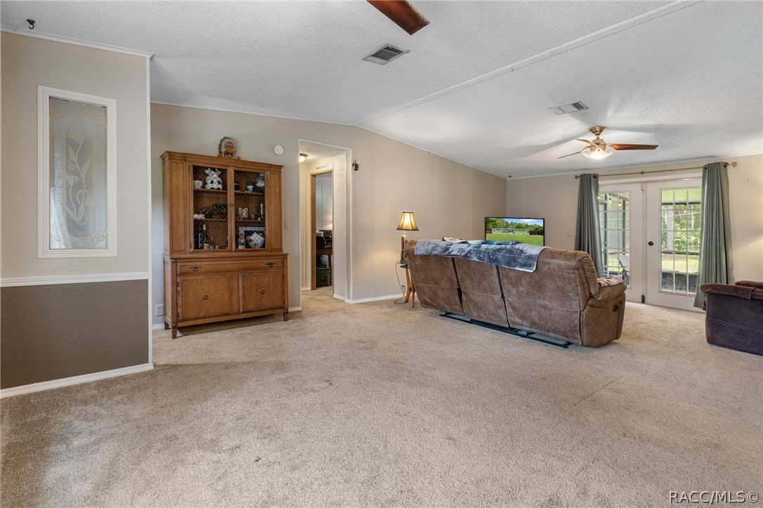 7927 West Cyprian Court Homosassa, FL 34448 - Photo 6 of 40 a living room with furniture and natural light