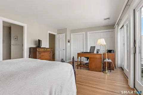 a view of a livingroom with furniture and wooden floor