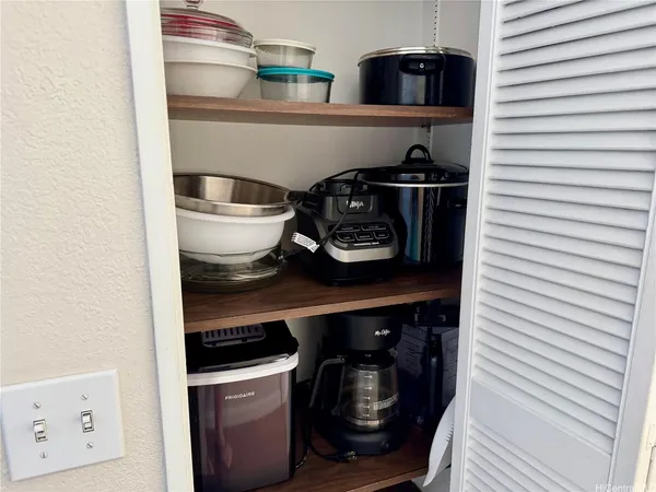 a close view of a stove and a refrigerator