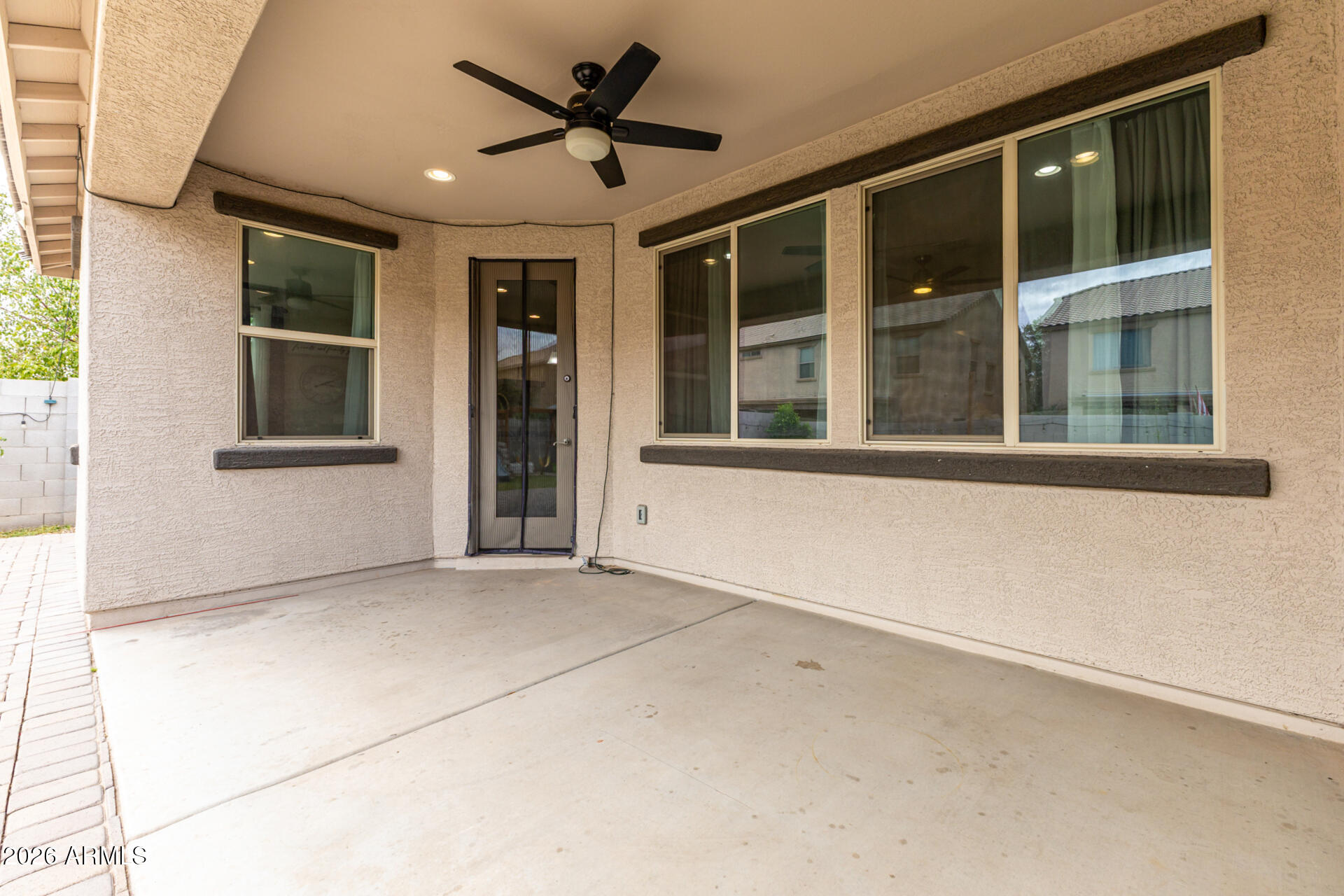 5347 West Lydia Lane Laveen, AZ 85339 - Photo 40 of 48 a view of an empty room with a window and kitchen view