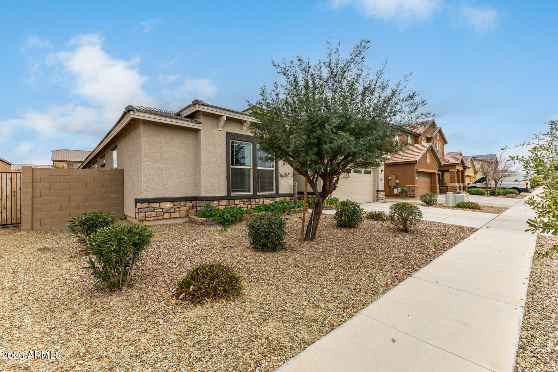 5347 West Lydia Lane Laveen, AZ 85339 - Photo 3 of 48 a front view of a house with garden