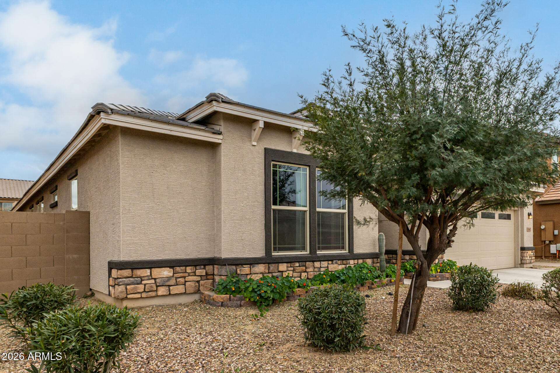 5347 West Lydia Lane Laveen, AZ 85339 - Photo 4 of 48 a house with a tree in front of it