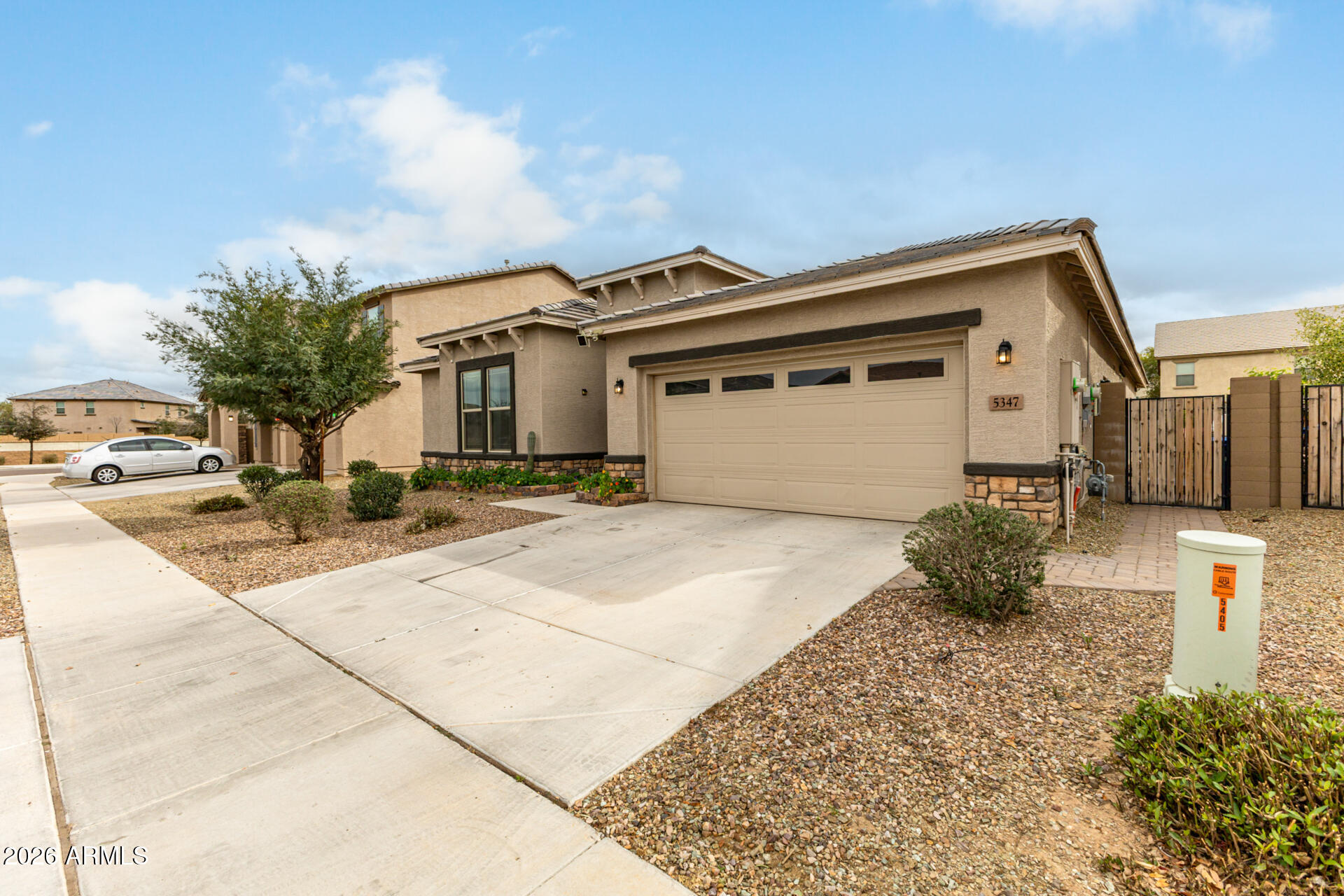 5347 West Lydia Lane Laveen, AZ 85339 - Photo 5 of 48 a front view of a house with garden
