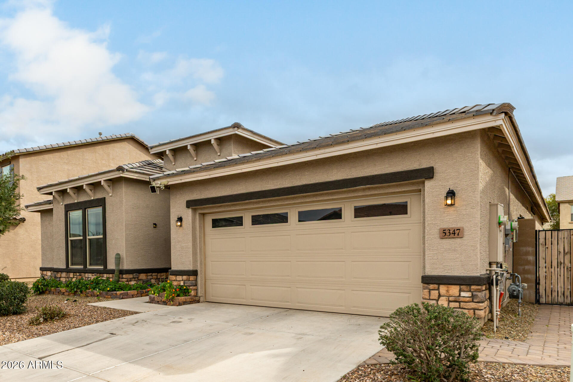 5347 West Lydia Lane Laveen, AZ 85339 - Photo 6 of 48 a front view of a house with a garden
