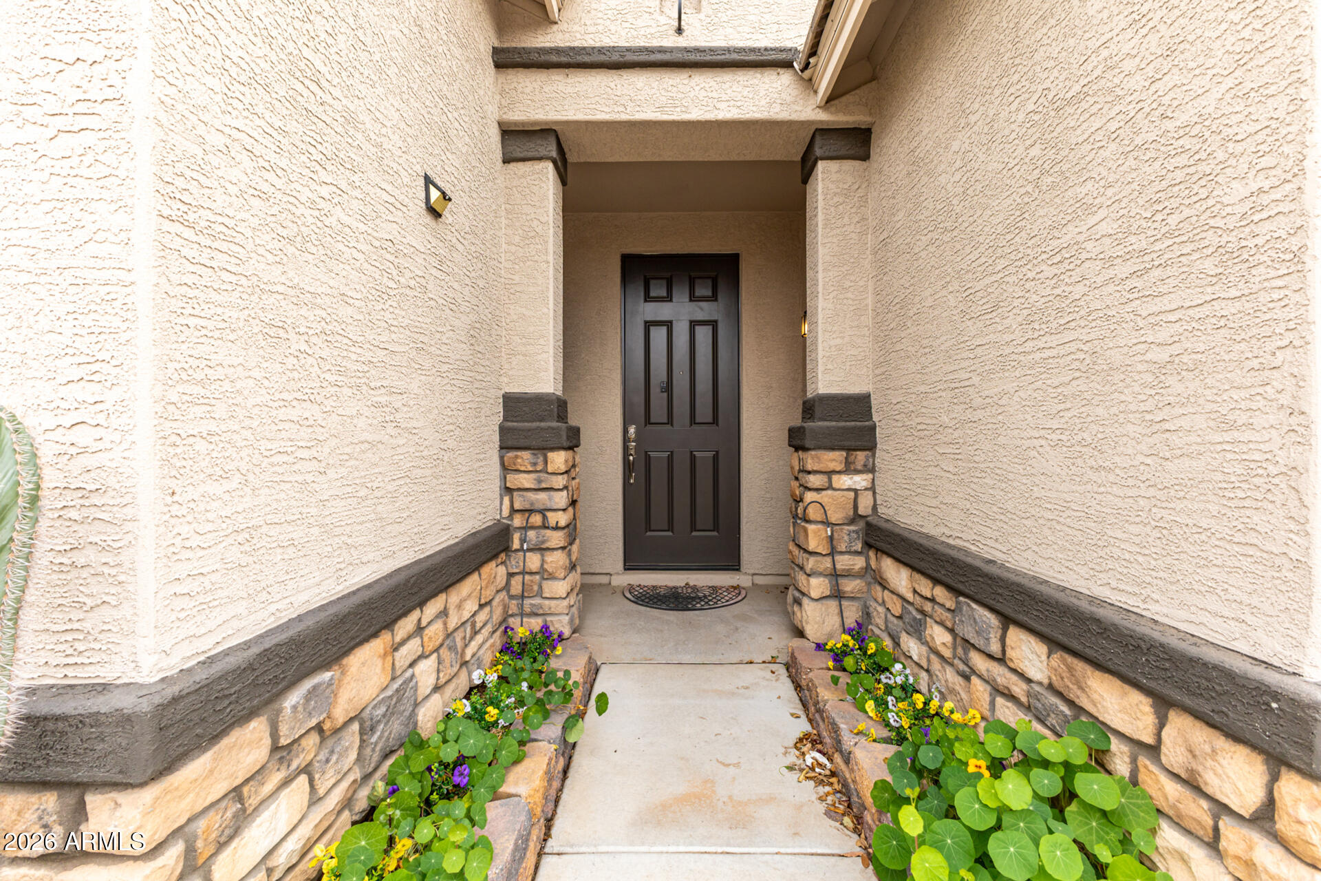 5347 West Lydia Lane Laveen, AZ 85339 - Photo 7 of 48 a front view of a house with a garden