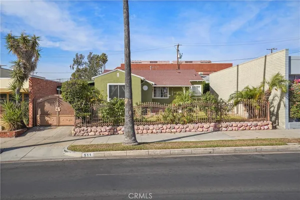 a front view of a building with street view