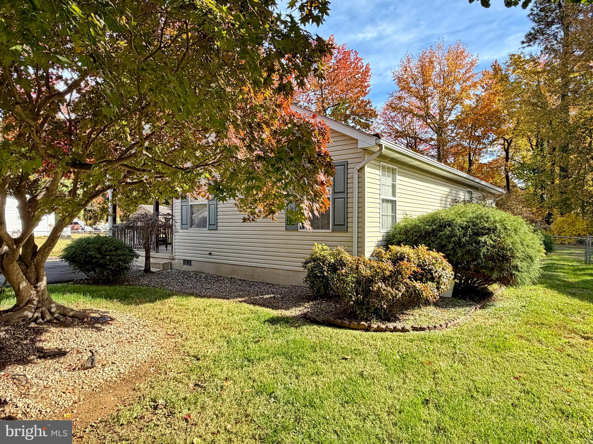 17466 Audrey Road Cobb Island, MD 20625 - Photo 12 of 59 a front view of a house with garden