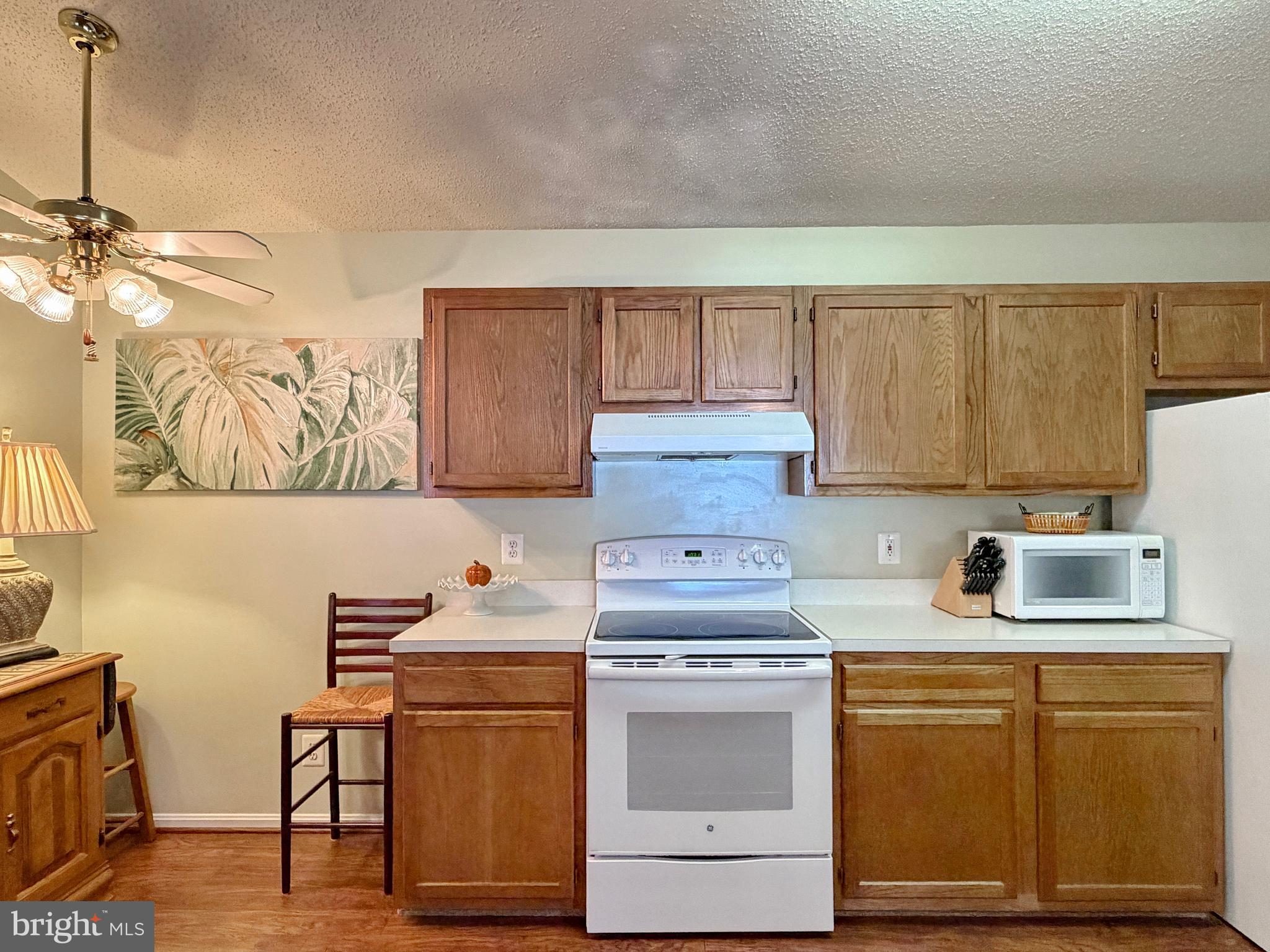 17466 Audrey Road Cobb Island, MD 20625 - Photo 24 of 59 a kitchen with a sink stove and cabinets