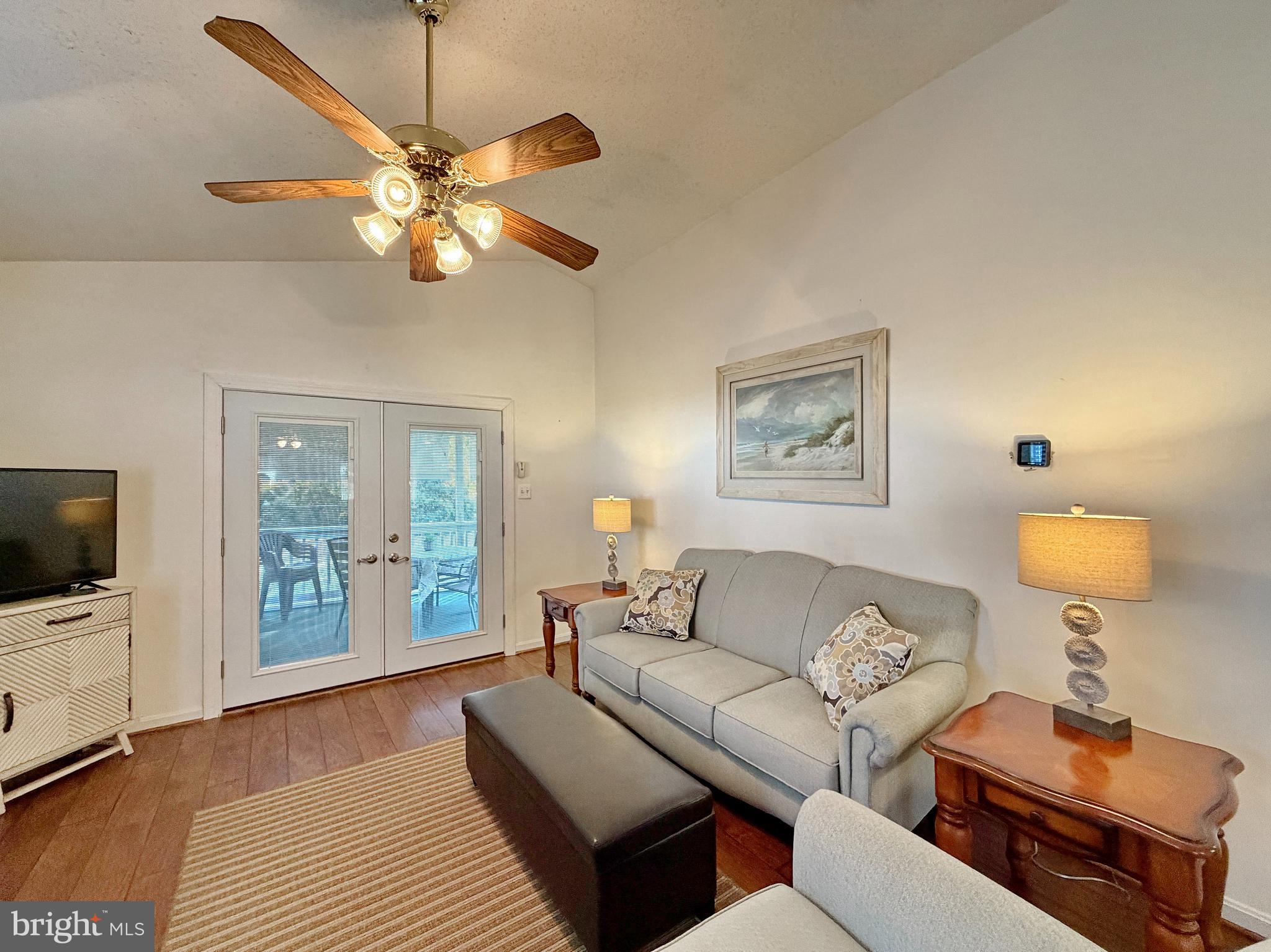 17466 Audrey Road Cobb Island, MD 20625 - Photo 33 of 59 a living room with furniture and a flat screen tv