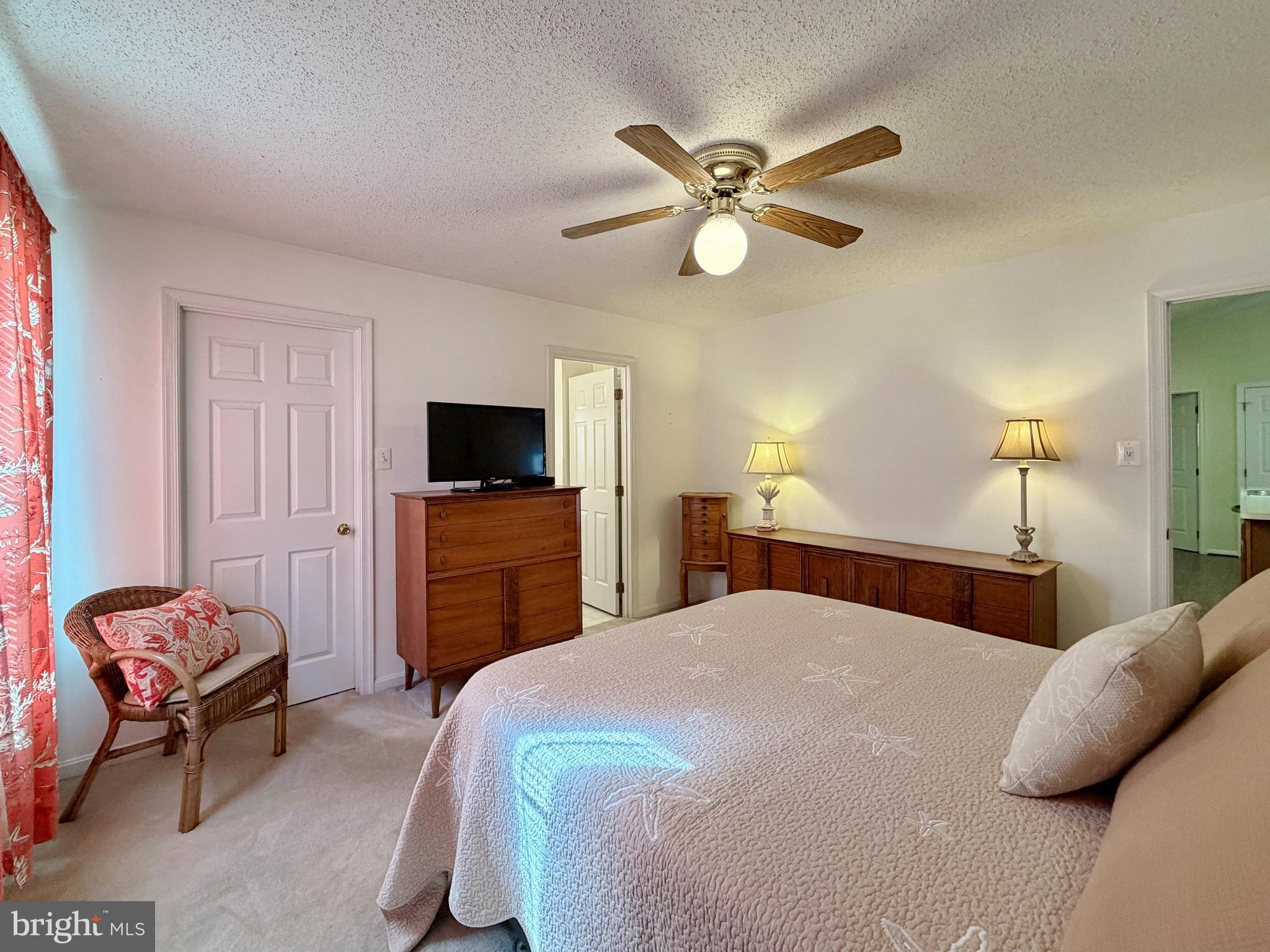 17466 Audrey Road Cobb Island, MD 20625 - Photo 38 of 59 a bedroom with a bed and a flat screen tv