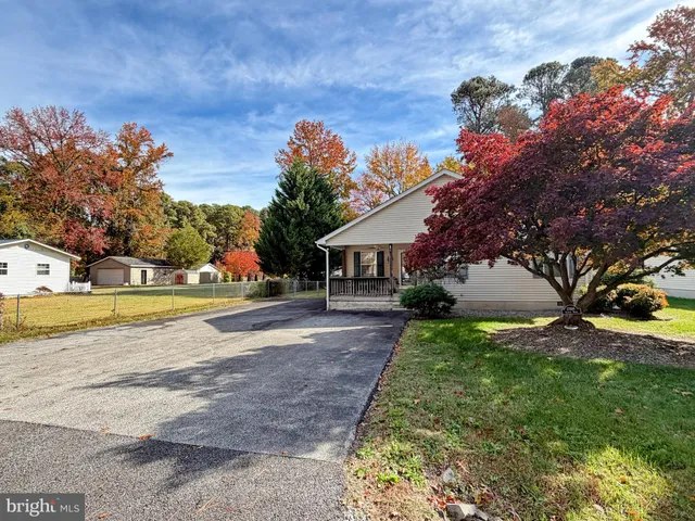 a outdoor living space with furniture and a potted plant
