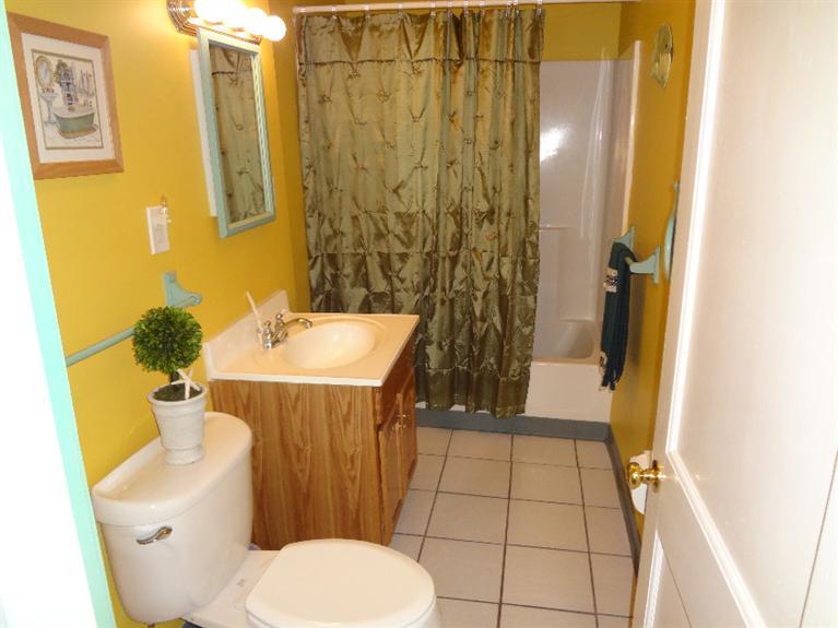 138 Spring Street Hyannis, MA 02601 - Photo 9 of 12 a bathroom with a sink and toilet