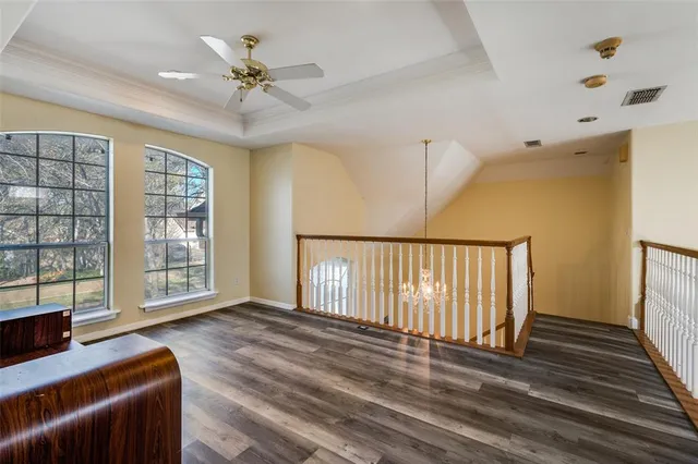 a view of livingroom with furniture window and wooden floor