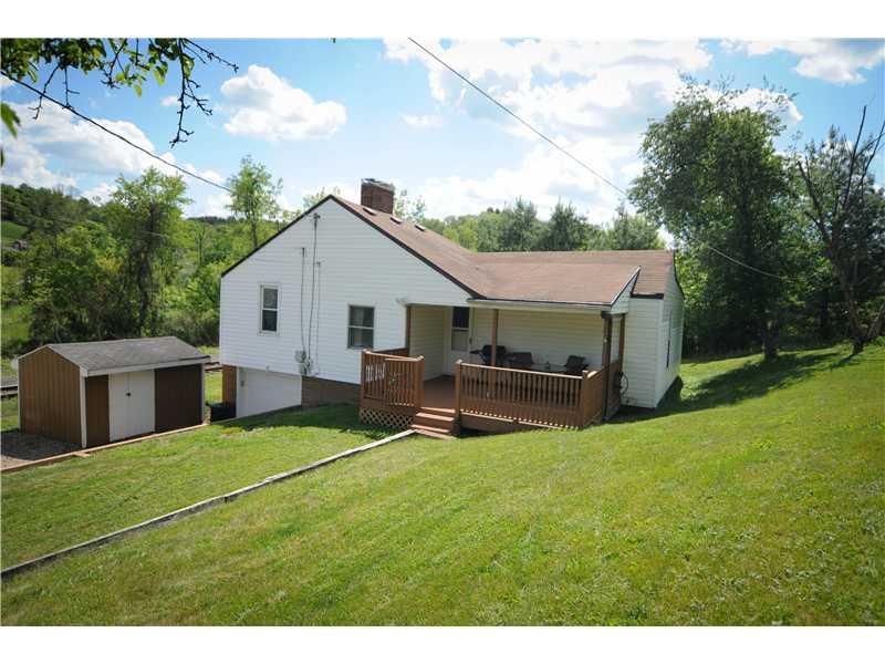 114 Lutes Road Venetia, PA 15367 - Photo 2 of 24 Exterior Front. Enjoy relaxation and privacy on the partially covered front deck.