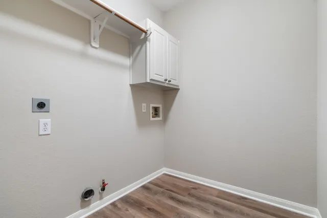 a view of a small space with racks on the wall