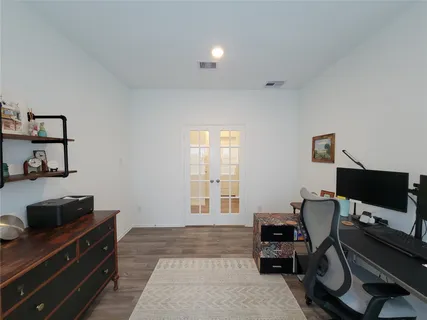 a kitchen with stainless steel appliances a sink a stove and a refrigerator