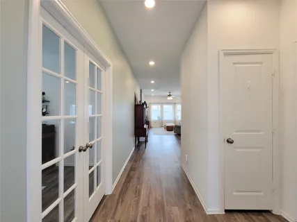 a large kitchen with stainless steel appliances lots of counter top space