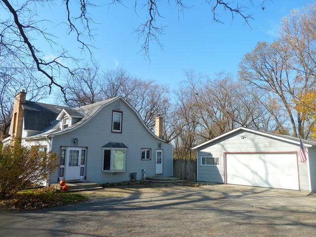 22968 West Grimm Road Antioch, IL 60002 - Photo 1 of 24 a view of a house with a yard