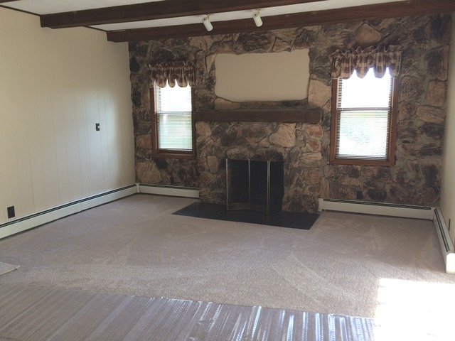22968 West Grimm Road Antioch, IL 60002 - Photo 11 of 24 a view of a livingroom with a fireplace and window