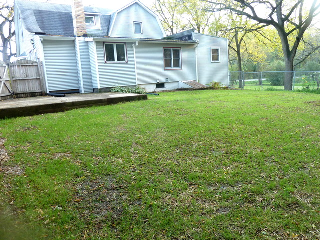 22968 West Grimm Road Antioch, IL 60002 - Photo 24 of 24 a view of a backyard with a garden