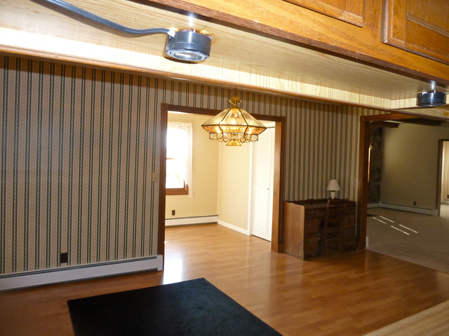 22968 West Grimm Road Antioch, IL 60002 - Photo 6 of 24 a view of a hallway with wooden floor