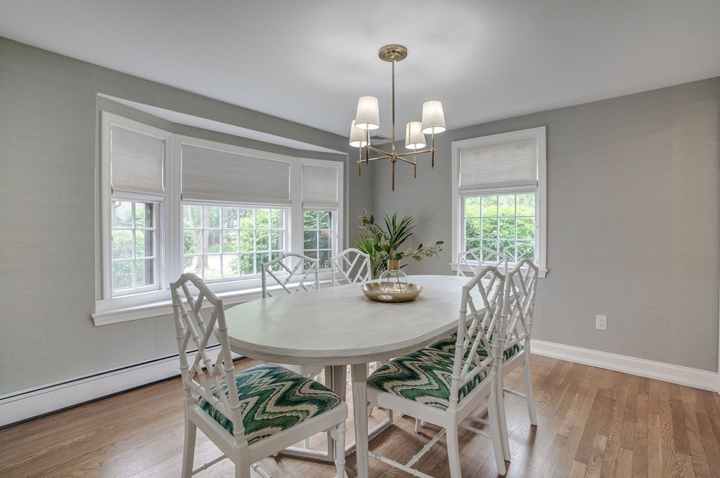 11 Avalon Road Reading, MA 01867 - Photo 22 of 31 a view of a dining room with furniture window and wooden floor