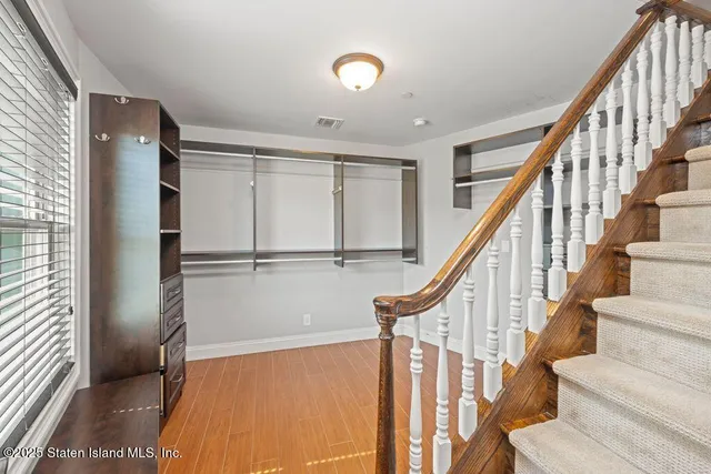 a view of entryway with wooden floor