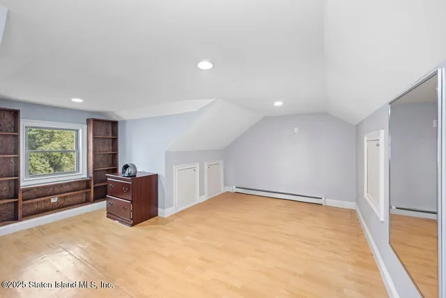 a view of workspace with furniture and window