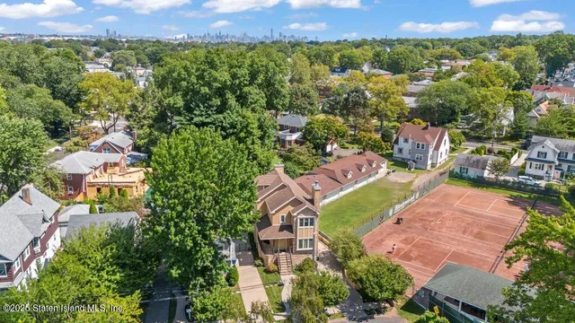 an aerial view of a house with a garden